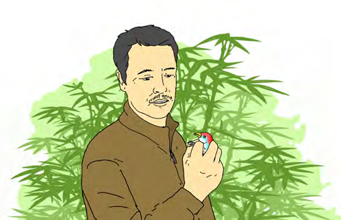 Chulong holds the small colourful bird he has just caught in his garden.
