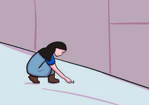 She bends down to pick up something small lying on the ground.