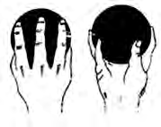 How the shot is gripped: it sits where the fingers meet the palm, supported by spread fingers