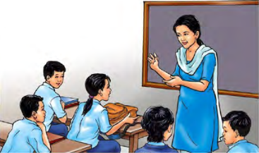 A teacher explaining a lesson: work that builds the next generation.