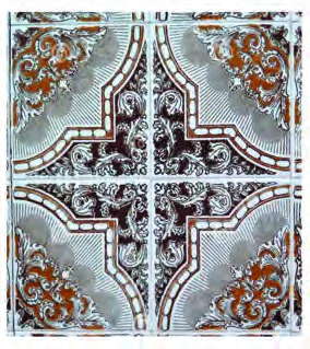 Square ceiling tiles of one size fitted corner to corner.