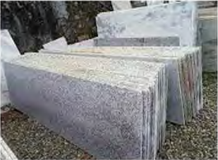 Cut slabs of marble, used to finish and decorate buildings.