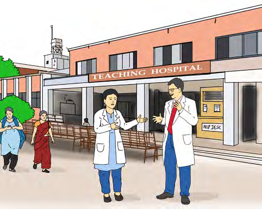 Two health workers talk in front of a teaching hospital, near the help desk where visitors ask for information.