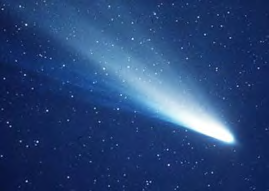 A comet with its tail stretching away in the direction opposite the sun