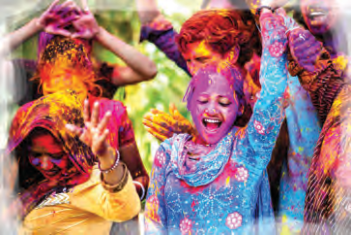 Holi: faces and clothes covered in coloured powder.