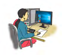 The woman is working on a computer.