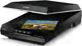 A scanner, with the lid raised over the glass bed on which a picture is laid face down.