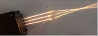 A convex lens bends three parallel beams so that they meet at one point.