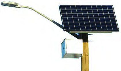 The parts of a solar street light: the panel on top, the box on the pole holding the battery and controller, and the LED lamp reaching over the road.