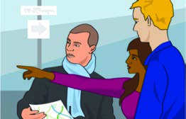 Three people at a station: a man holding a map asks the way, and a lady points the direction with her arm stretched out. Guessing what such a picture shows is the first step of every listening task.