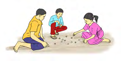 Three children playing marbles on the ground.