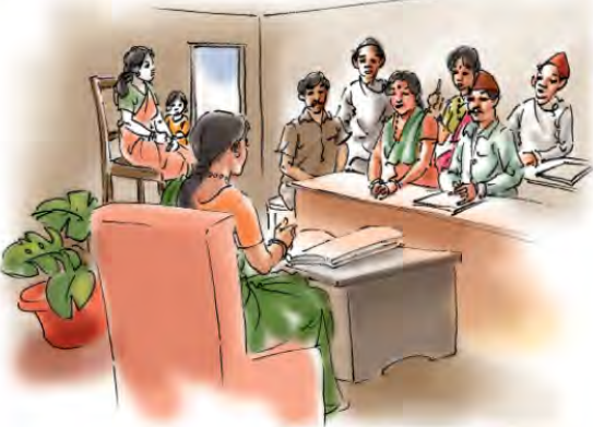 कार्यालयमा टेबलपछाडि बसेकी महिला अधिकारीसामु आफ्ना कुरा राख्न आएका सेवाग्राहीहरू।