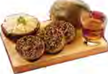 Haggis served with turnips and potatoes