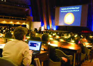 The IAU symposium of 2019, with astronomers from many countries in one hall listening to new research