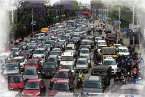 Every one of these vehicles burns petrol or diesel and gives out carbon dioxide. Cutting this output is what reducing carbon emission means.