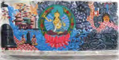 A painted street mural in Kathmandu, the kind of 'riot of colour' the writer found stretching along the city's walls.