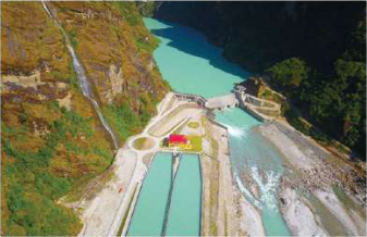 Water stored behind the dam of the Upper Tamakoshi Hydroelectric Project in Dolakha District