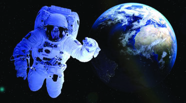 An astronaut floating in space, with the Earth hanging behind him. Nothing else shows so clearly that people can now leave the planet.