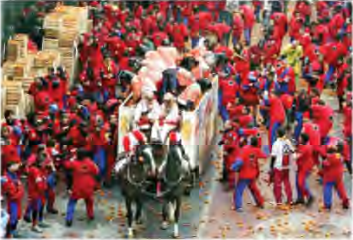 Throwers on foot crowd round a horse-drawn cart; the riders are armoured, the throwers are not.