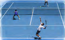 Tennis: players on each side of a long net hit the ball with rackets.