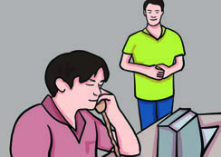 A man on the telephone at a service desk, the situation the listening audio drops you into.