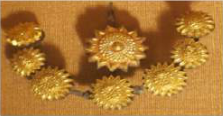 Gold ornaments. Gold hardly reacts with anything, so it keeps its shine for years.