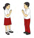 Two children greet each other with folded hands when they meet.