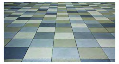 Square floor tiles repeating in rows and columns until the whole floor is covered.
