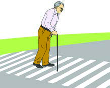 An old man crossing the road alone with his stick. Should someone be helping him?