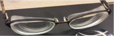 The glasses of these spectacles have curved, spherical surfaces rather than flat ones.