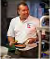 Chef Santosh Shah at work in a professional kitchen