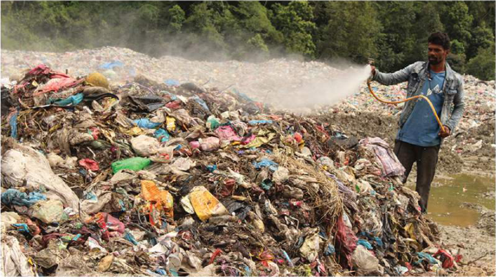 Ceramics, glass, plastic, fiber and other waste heaped at the Sisdole dumping site
