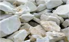 Lumps of limestone, the rock taken from the quarry and carried to a cement works.