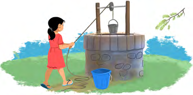 A pulley in use: pulling one end of the rope down raises the bucket at the other end.