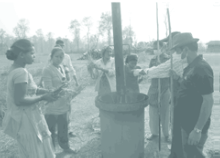 Biomass being burnt in a drum with little oxygen to prepare the char.
